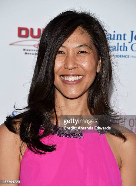 Founding Event Chair Dr. Maggie DiNome arrives at the 2014 Power Of Pink: An Acoustic Evening With P!nk And Friends event at The House of Blues...