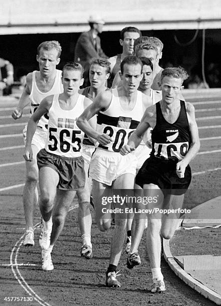 Foreground, left to right: Bengt Najde of Sweden , eventual silver medallist Harald Norpoth of Germany and Murray Halberg of New Zealand , compete in...