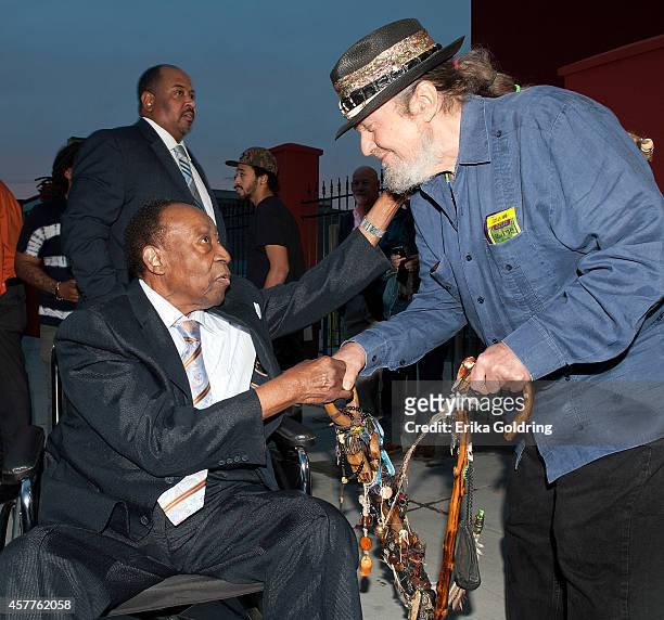 Dave Bartholomew greets Mac Rebennack aka Dr. John during the closing night of the New Orleans Film Festival at The Carver Theater on October 23,...