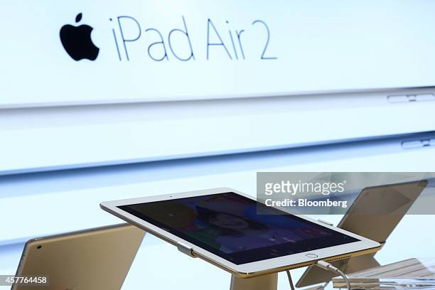 Apple Inc.'s new iPad Air 2 tablet is displayed at a SoftBank Corp. Store in the Ginza district of Tokyo, Japan, on Friday, Oct. 24, 2014. Apple last...