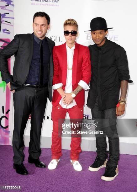 Producer Scooter Braun, Producer/singers Justin Bieber and Usher attend "Justin Bieber's Believe" world premiere at Regal Cinemas L.A. Live on...