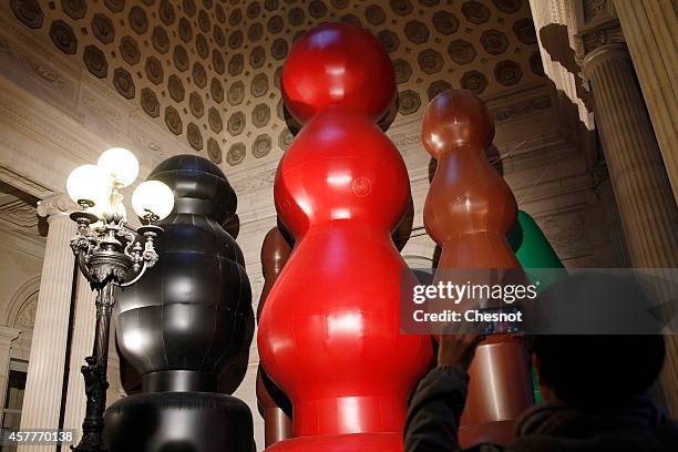 Giant inflatable sculptures are displayed by Controversial US artist, Paul McCarthy during his 'Chocolate Factory' exhibition at the Monnaie de Paris...