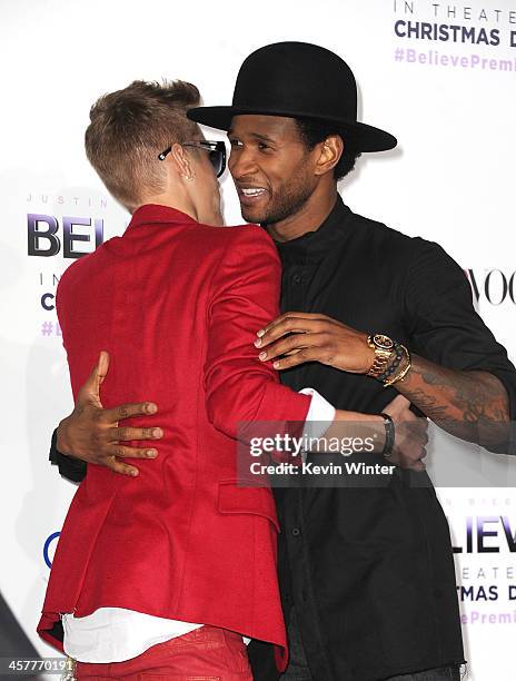 Singer/producer Justin Bieber and producer Usher arrives at the premiere Of Open Road Films' "Justin Bieber's Believe" at Regal Cinemas L.A. Live on...