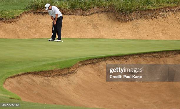 Scott Laycock of Australia putts on the 8th green during day two of the Perth International at Lake Karrinyup Country Club on October 24, 2014 in...