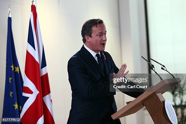 British Prime Minister David Cameron speaks during a press conference at the end of a two-day European Council meeting at the headquarters of the...