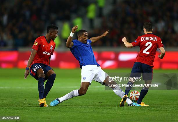 Sylvain Distin of Everton in action with Divock Origi and Sebastian Corchia of Lille during the UEFA Europa League match between LOSC Lille and...