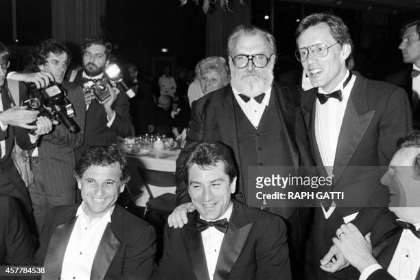 Actors Joe Pesci, Robert de Niro, Italian film director Sergio Leone and actors James Wood and Danny Aiello pose after the screening of the film...