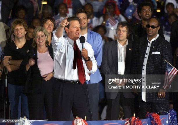 Democratic presidental candidate US Vice President Al Gore addresses a rally in South Beach in Miami on stage with musician John Bon Jovi , his wife...