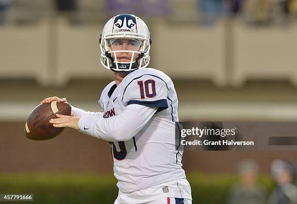 Chandler Whitmer of the Connecticut Huskies against the East Carolina Pirates during their game at Dowdy-Ficklen Stadium on October 23, 2014 in...