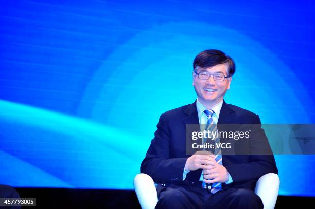 Li Yue, Chief Executive Officer of China Mobile Limited, looks on during the China Mobile Global Partner Conference 2013 at Poly World Trade Center...