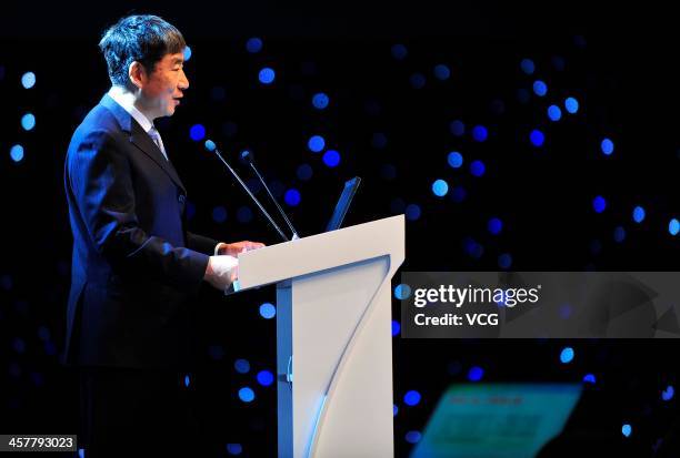 Xi Guohua, Chairman of China Mobile Limited, speaks during the China Mobile Global Partner Conference 2013 at Poly World Trade Center on December 18,...