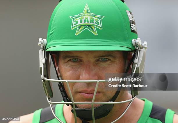 Brad Hodge of the Stars looks on during a Melbourne Stars Big Bash League training session at the Melbourne Cricket Ground on December 19, 2013 in...