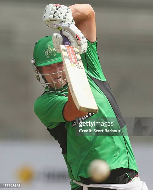 Cameron White of the Stars bats during a Melbourne Stars Big Bash League training session at the Melbourne Cricket Ground on December 19, 2013 in...