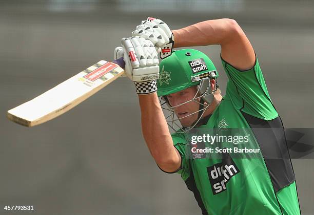 Cameron White of the Stars bats during a Melbourne Stars Big Bash League training session at the Melbourne Cricket Ground on December 19, 2013 in...