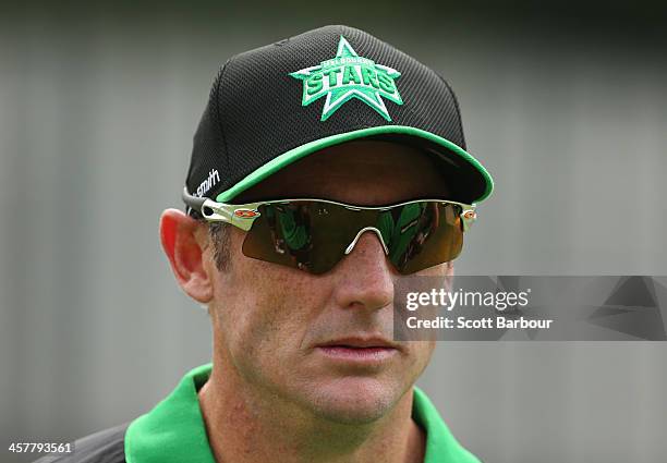 David Hussey of the Stars looks on during a Melbourne Stars Big Bash League training session at the Melbourne Cricket Ground on December 19, 2013 in...