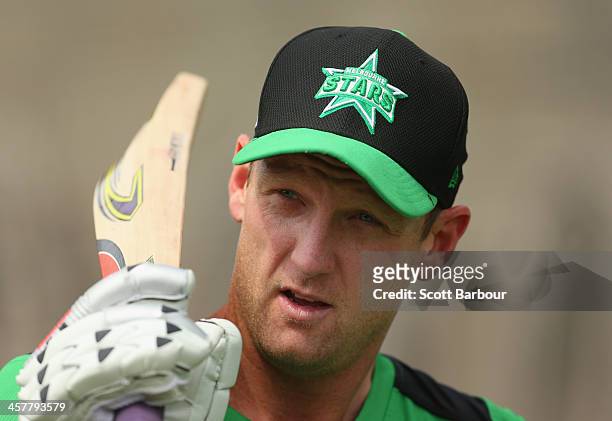 Cameron White of the Stars looks on during a Melbourne Stars Big Bash League training session at the Melbourne Cricket Ground on December 19, 2013 in...