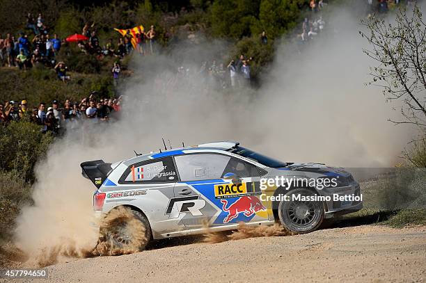 Sebastien Ogier of France and Julien Ingrassia of France compete in their Volkswagen Motorsport Volkswagen Polo R WRC during Day One of the WRC Spain...