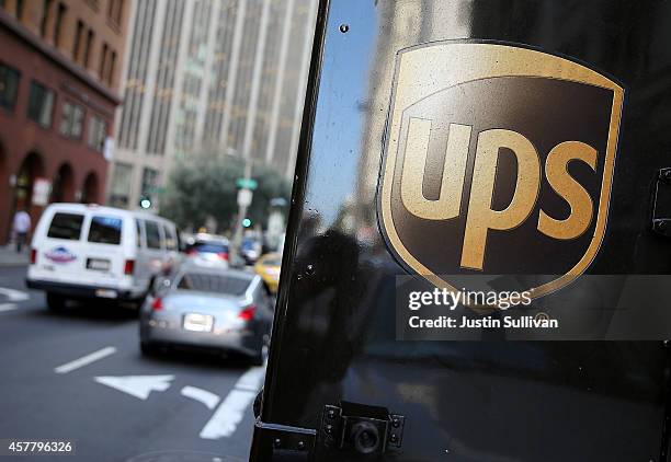 United Parcel Service logo is displayed on a delivery truck on October 24, 2014 in San Francisco, California. United Parcel Service reported...