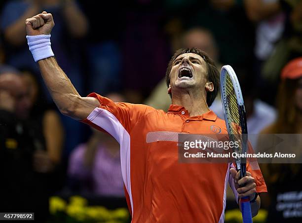 Tommy Robredo of Spain celebrates defeating Pablo Andujar of Spain during day five of the ATP 500 World Tour Valencia Open tennis tournament at the...