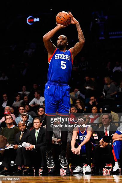 Arnett Moultrie of the Philadelphia 76ers shoots in a preseason game against the Brooklyn Nets at the Barclays Center on October 20, 2014 in New York...