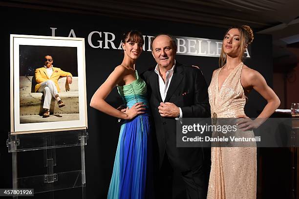 Elisa Menichelli, Gerry Scotti and Soleil Sorge attend the Gala Dinner 'La Grande Bellezza' during the 9th Rome Film Festival on October 24, 2014 in...