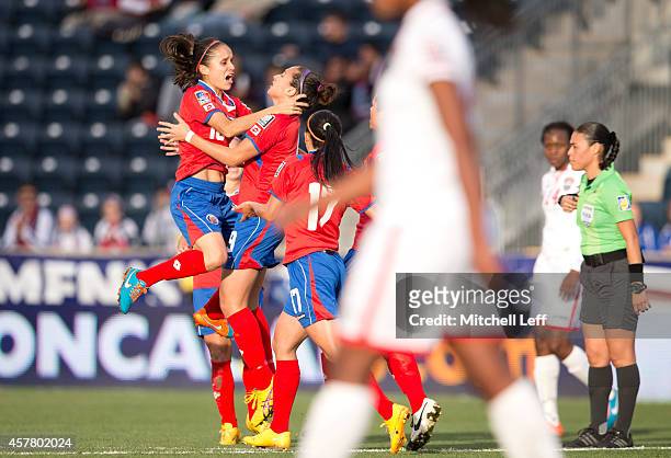 The Costa Rica team reacts after Carolina Venegas scored a goal in the first half against Trinidad & Tobago in the 2014 CONCACAF Women's Championship...