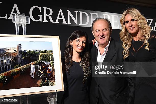 Alessandra Moschillo, Gerry Scotti and Tiziana Rocca attend the Gala Dinner 'La Grande Bellezza' during the 9th Rome Film Festival on October 24,...