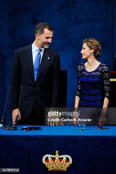 King Felipe VI of Spain and Queen Letizia of Spain attend the Principe de Asturias Awards 2014 ceremony at the Campoamor Theater on October 24, 2014...
