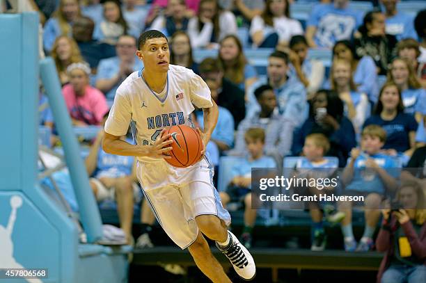 Justin Jackson of the North Carolina Tar Heels moves the ball against the Fayetteville State University Broncos during their game at the Dean Smith...