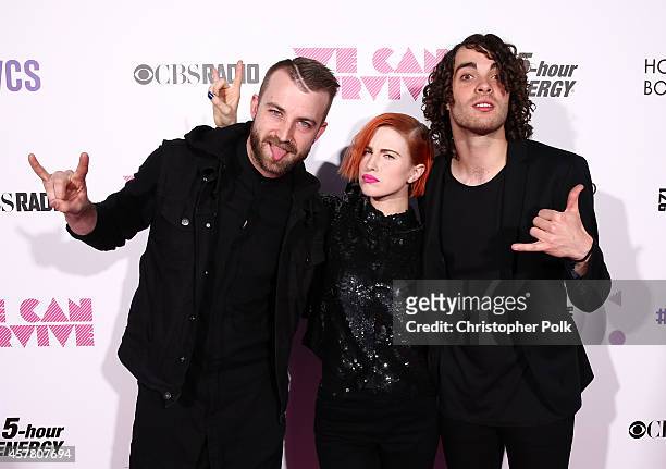Musician Jeremy Davis, singer Hayley Williams and musician Taylor York of Paramore pose backstage during CBS Radio's We Can Survive at the Hollywood...