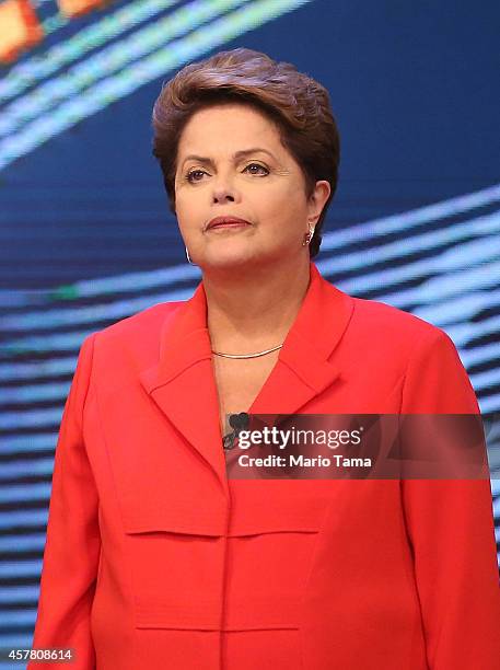 Brazilian President and Workers' Party candidate Dilma Rousseff waves to the audience prior to the debate with Presidential candidate of the...