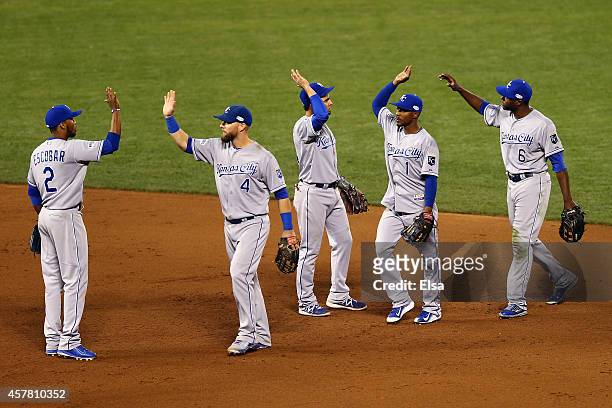 The Kansas City Royals celebrate the 3-2 victory against the San Francisco Giants during Game Three of the 2014 World Series at AT&T Park on October...