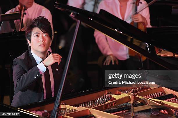 Musician and UN Messenger of Peace Lang Lang performs at the 2014 United Nations Day Concert at United Nations on October 24, 2014 in New York City.