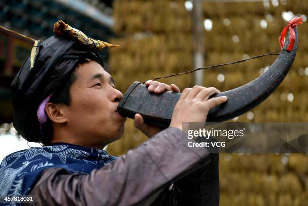 Miao nationality man wearing traditional dress during the Sama Festival on December 18, 2013 in Rongjiang, China. The Sama Festival, one of China's...
