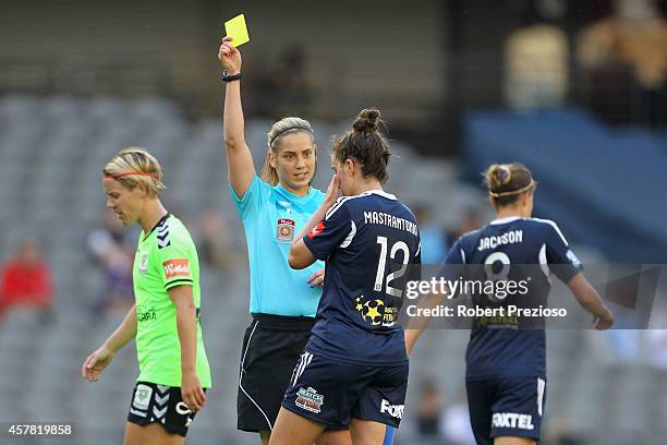 Ella Mastrantonio of the Victory receives a yellow card during the round seven W-League match between Melbourne and Canberra at Etihad Stadium on...