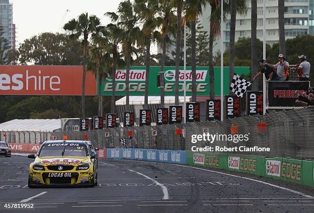 Shane van Gisbergen driving the TEKNO VIP Petfoods Holden crosses the line to win race 31 for the Gold Coast 600, which is round 12 of the V8...