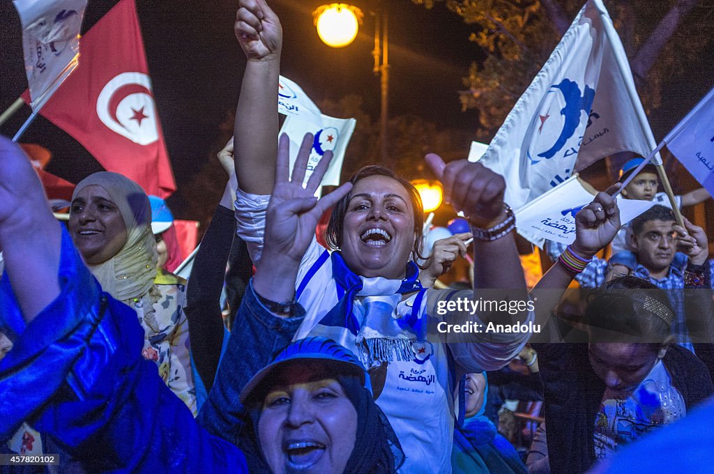 Rashid al-Ghannushi holds a rally ahead of Tunisian parliamentary election