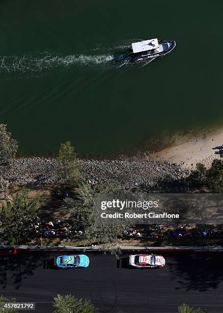 David Wall driving the Security Racing Ford is followed by Robert Dahlgren driving the Valvoline Racing Volvo during race 31 for the Gold Coast 600,...