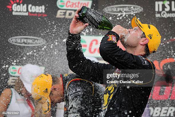 Shane van Gisbergen and Jonathon Webb drivers of the TEKNO VIP Petfoods Holden celebrates after winning race 31 for the Gold Coast 600, which is...