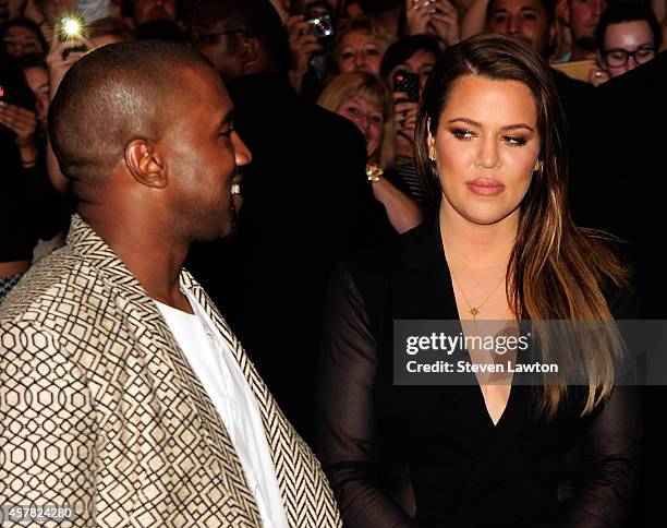 Musician Kanye West and television personality Khole Kardashian arrive at the Tao Nightclub at the Venetian Resort Hotel Casino on October 24, 2014...
