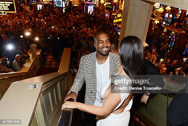 Kanye West and Kim Kardashian West arrive at TAO Nightclub to celebrate her birthday at the Venetian on October 24, 2014 in Las Vegas, Nevada.