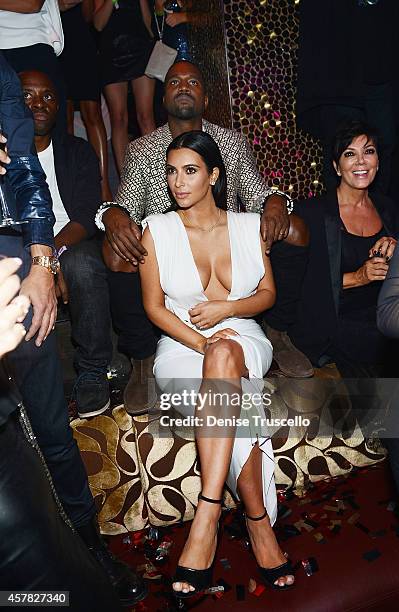 Kanye West and Kim Kardashian West celebrate Kim's birthday at TAO Nightclub to celebrate her birthday at the Venetian on October 24, 2014 in Las...