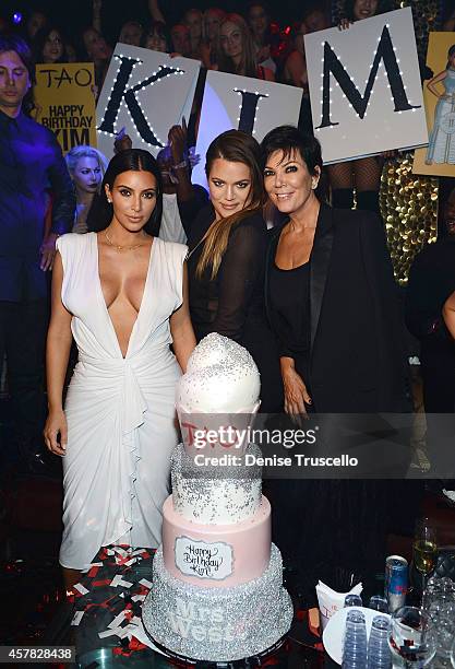 Kim Kardashian West, Khloe Kardashian and Kris Jenner celebrate Kim's birthday at TAO Nightclub at the Venetian on October 24, 2014 in Las Vegas,...
