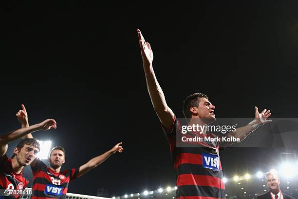 Tomi Juric of the Wanderers celebrates with his team in front of the crowd after victory during the Asian Champions League final match between the...