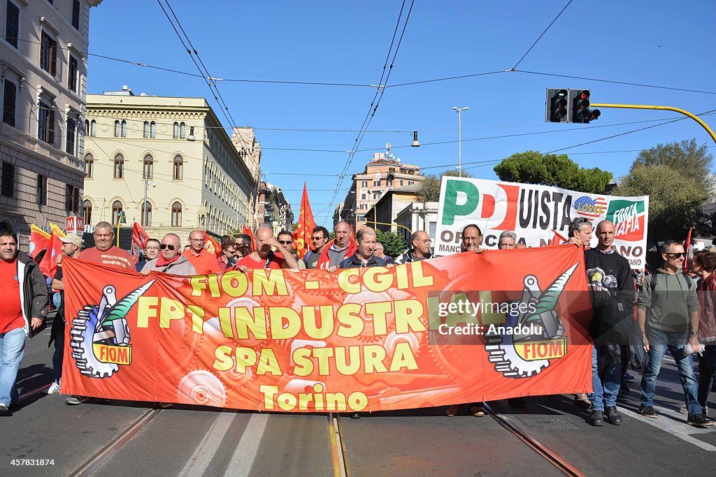 Italian workers hold a protest in Rome