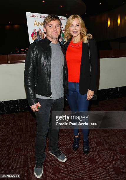 Actors Rick Schroder and Eloise Dejoria attend the screening of "Angels Sing" at ArcLight Cinemas on December 18, 2013 in Hollywood, California.