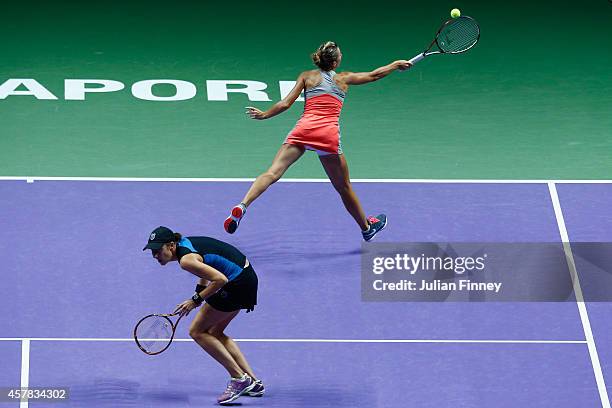 Kveta Peschke of Czech Republic and Katarina Srebotnik of Slovenia in action against Cara Black of Zimbabwe and Sania Mirza of India in the doubles...