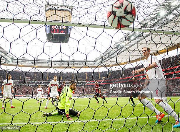 Alexander Madlung of Frankfurt scores his team's first goal against goalkeeper Thorsten Kirschbaum of Stuttgart during the Bundesliga match between...