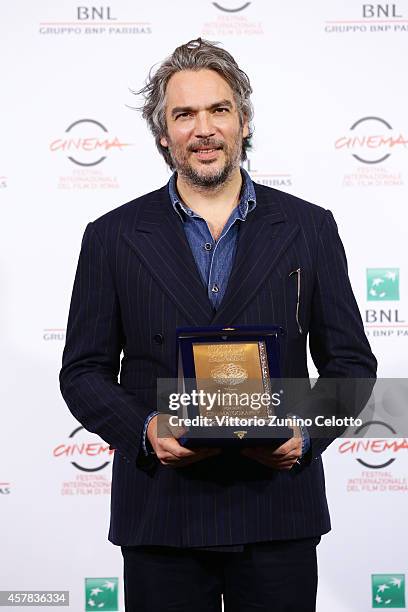 Andrea Di Stefano is bestowed with the AIC Award for the Best Photography at the Collateral Awards Photocall during the 9th Rome Film Festival at...