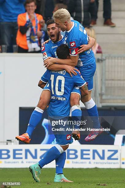 Kevin Volland of Hoffenheim celebrates scoring the opening goal with his team mate Roberto Firminio and Andreas Beck during the Bundesliga match...